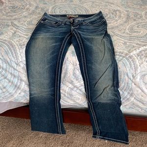 BKE distressed denim. Flapjack pockets. Boot cut low rise